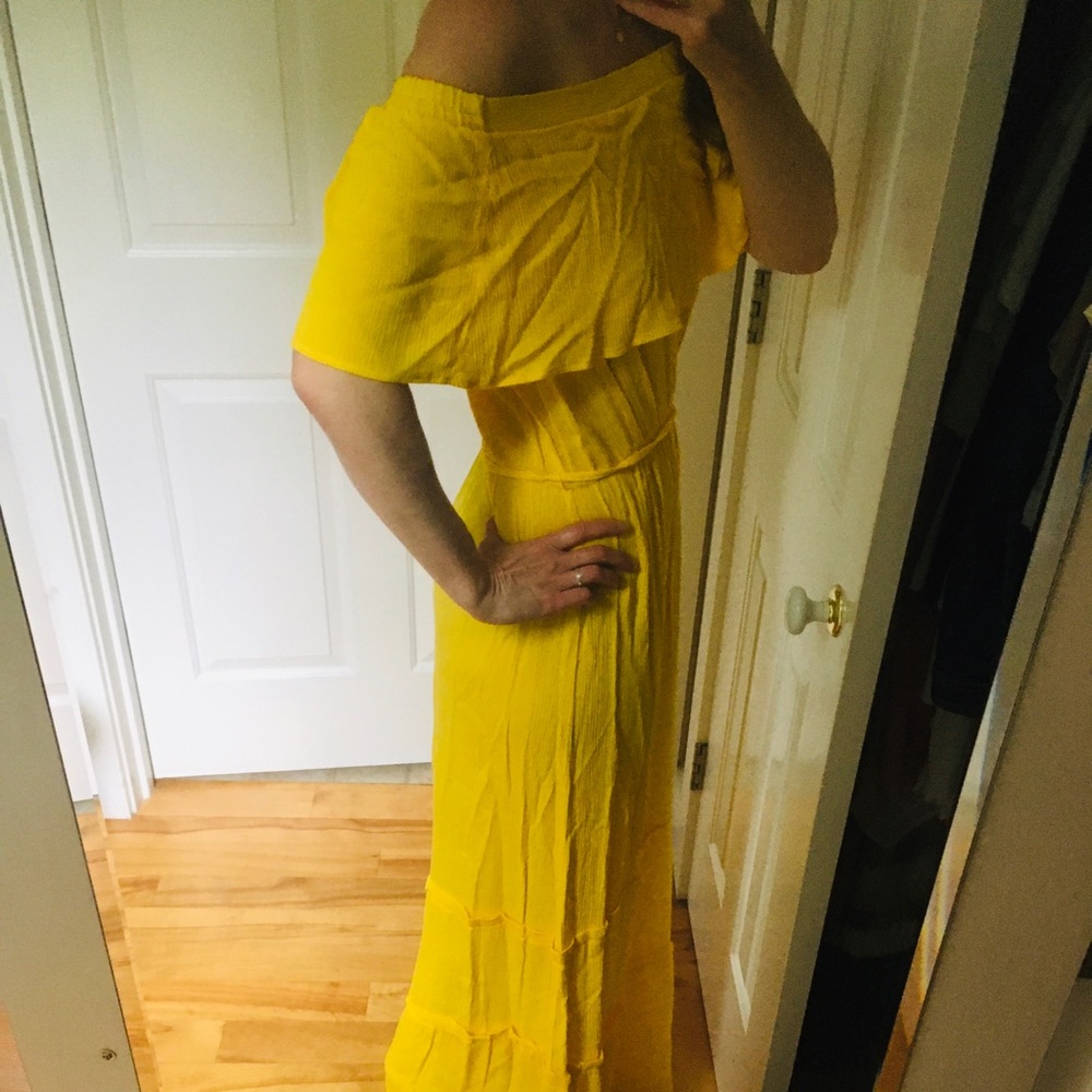 Yellow off the shoulder maxi dress.